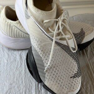 Nike training sneakers in a white and black colorway. Comfortable ever